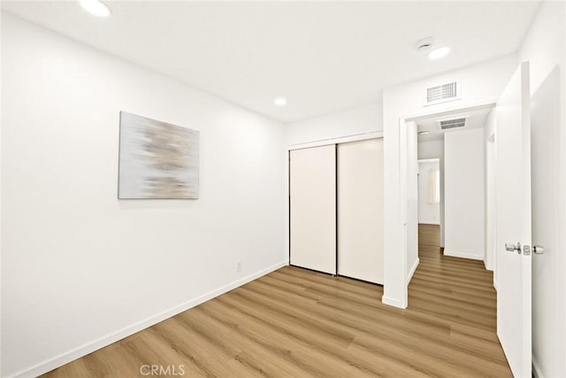 828 N Garfield Ave Unit C, Alhambra, CA 91801 - unfurnished bedroom featuring light wood-type flooring, recessed lighting, and a closet