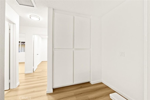 828 N Garfield Ave Unit C, Alhambra, CA 91801 - corridor featuring light wood finished floors and baseboards