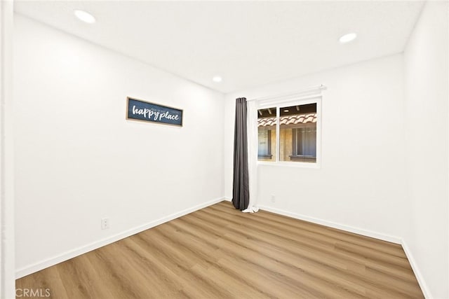 828 N Garfield Ave Unit C, Alhambra, CA 91801 - spare room with wood finished floors and recessed lighting