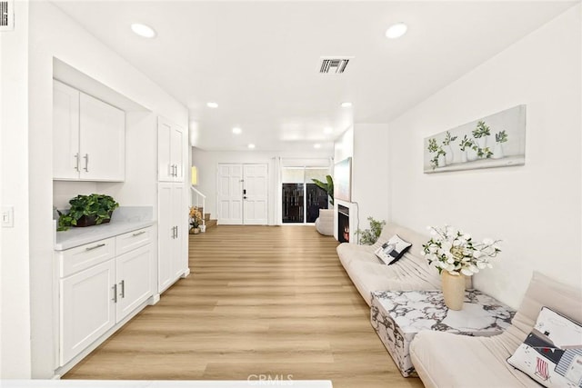828 N Garfield Ave Unit C, Alhambra, CA 91801 - living area with light wood-style flooring and recessed lighting