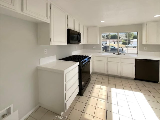 995 Northpark Blvd, San Bernardino, CA 92407 - kitchen featuring black appliances, white cabinetry, light tile patterned flooring, light countertops, and recessed lighting