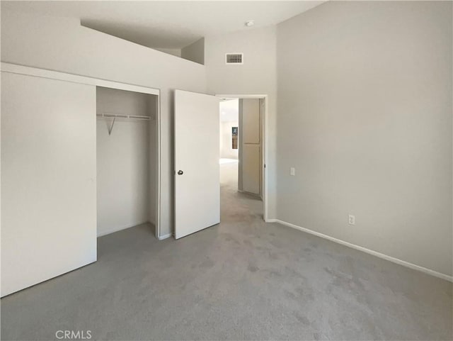 995 Northpark Blvd, San Bernardino, CA 92407 - unfurnished bedroom with carpet flooring, a closet, and lofted ceiling