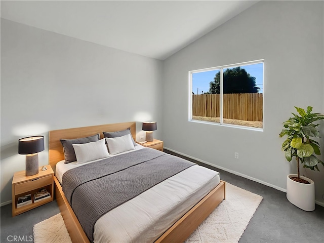 995 Northpark Blvd, San Bernardino, CA 92407 - bedroom featuring vaulted ceiling and carpet