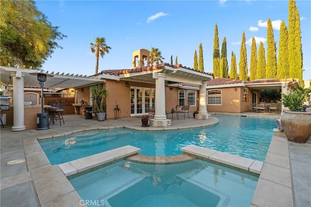 6720 Sycamore Ln, Palmdale, CA 93551 - view of pool with a pergola, a patio, a pool with connected hot tub, and french doors