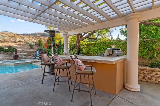 6720 Sycamore Ln, Palmdale, CA 93551 - view of patio featuring exterior kitchen and a pool with connected hot tub