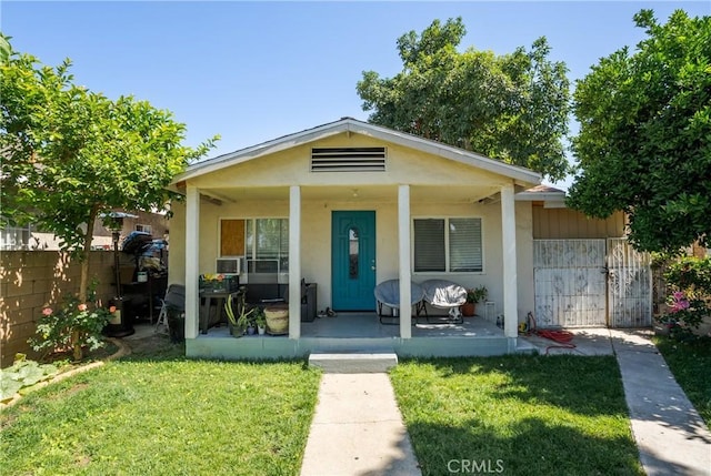 215 E 11th St Unit 4, Pomona, CA 91766 - bungalow featuring a porch and stucco siding