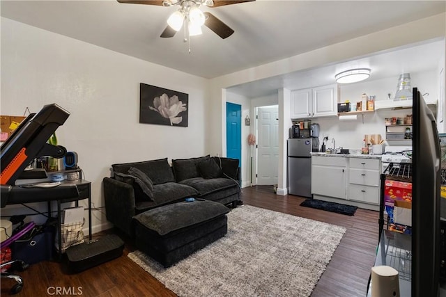 215 E 11th St Unit 4, Pomona, CA 91766 - living area with ceiling fan and dark wood finished floors