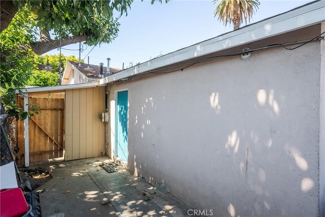 215 E 11th St Unit 4, Pomona, CA 91766 - view of home's exterior with stucco siding and a gate