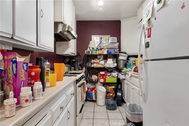 215 E 11th St Unit 4, Pomona, CA 91766 - kitchen with white appliances, under cabinet range hood, light tile patterned flooring, and white cabinetry
