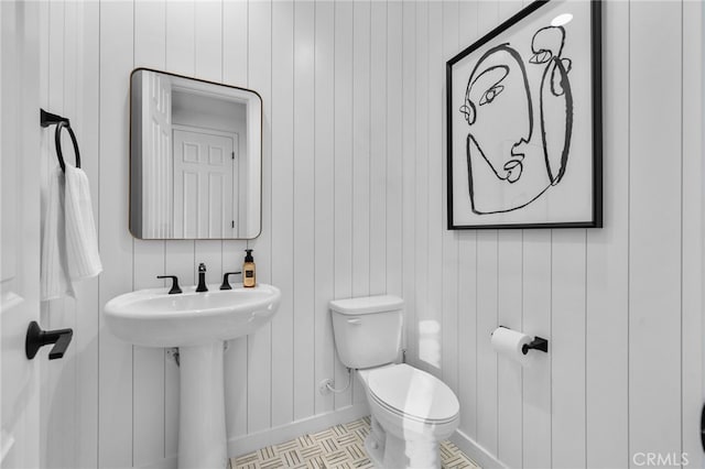 11824 Stonefield Dr, Corona, CA 92883 - bathroom with toilet and wood walls