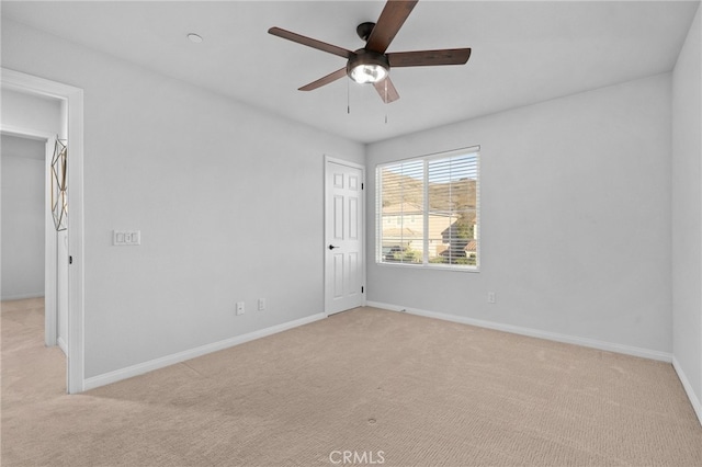 11824 Stonefield Dr, Corona, CA 92883 - empty room with light colored carpet and a ceiling fan