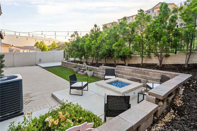 11824 Stonefield Dr, Corona, CA 92883 - fenced backyard featuring an outdoor fire pit and a patio