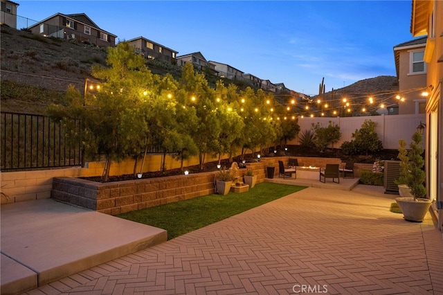 11824 Stonefield Dr, Corona, CA 92883 - fenced backyard featuring a patio area and an outdoor hangout area