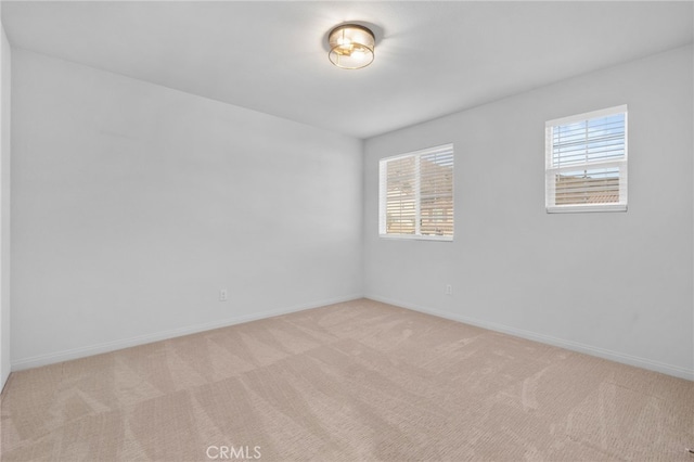 11824 Stonefield Dr, Corona, CA 92883 - empty room featuring light colored carpet and plenty of natural light