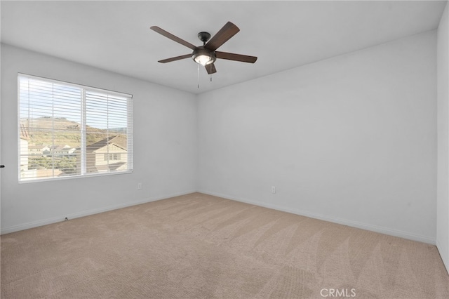 11824 Stonefield Dr, Corona, CA 92883 - empty room featuring light carpet and a ceiling fan