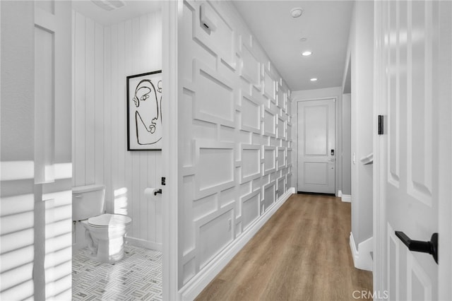 11824 Stonefield Dr, Corona, CA 92883 - corridor featuring wood finished floors and recessed lighting