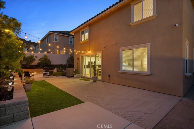 11824 Stonefield Dr, Corona, CA 92883 - rear view of property with a patio and stucco siding