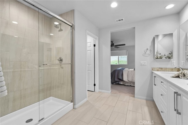 11824 Stonefield Dr, Corona, CA 92883 - full bathroom featuring ensuite bath, double vanity, a shower stall, ceiling fan, and recessed lighting