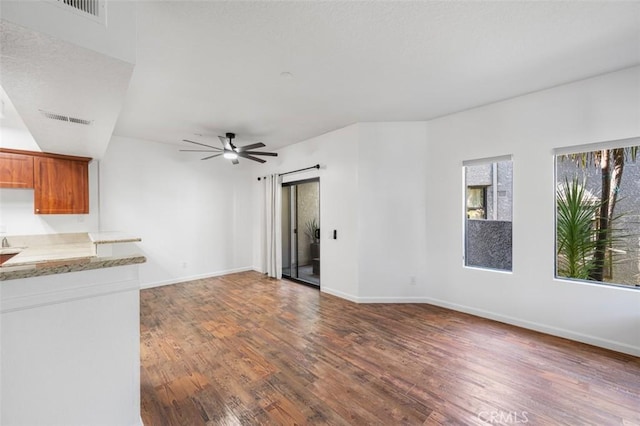 4822 Tiara Dr Unit 104, Huntington Beach, CA 92649 - unfurnished living room featuring wood finished floors and ceiling fan