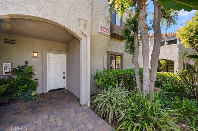 4822 Tiara Dr Unit 104, Huntington Beach, CA 92649 - entrance to property with stucco siding