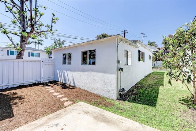 708 S Redondo Ave, Manhattan Beach, CA 90266 - view of home's exterior featuring a patio and stucco siding