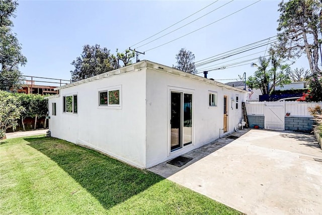 708 S Redondo Ave, Manhattan Beach, CA 90266 - rear view of house featuring a patio area, stucco siding, and a gate