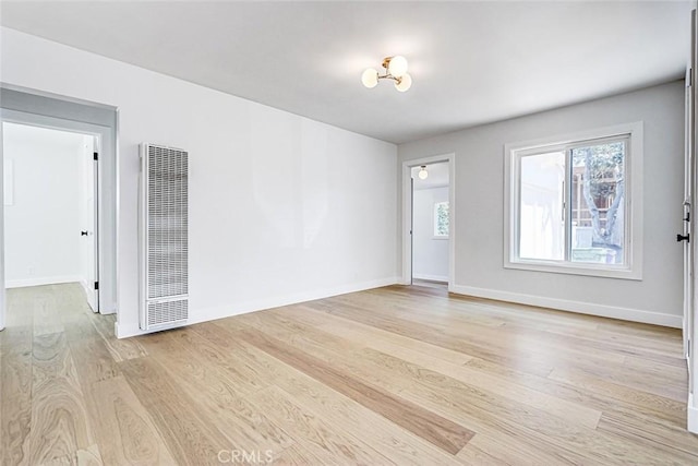 708 S Redondo Ave, Manhattan Beach, CA 90266 - spare room featuring a heating unit and light wood finished floors