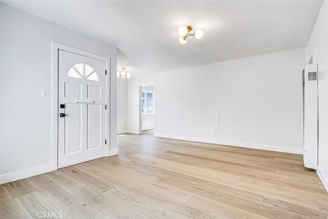 708 S Redondo Ave, Manhattan Beach, CA 90266 - foyer entrance with light wood-style flooring and baseboards
