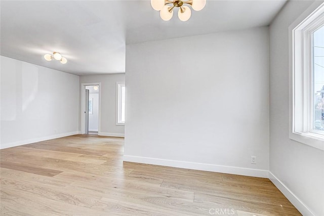 708 S Redondo Ave, Manhattan Beach, CA 90266 - spare room with light wood-style flooring and baseboards