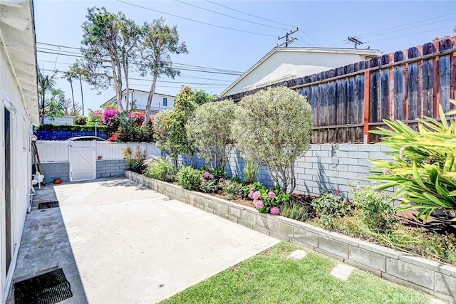 708 S Redondo Ave, Manhattan Beach, CA 90266 - fenced backyard featuring a patio and a gate