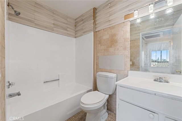 450 E 4th St Unit 419, Santa Ana, CA 92701 - full bath featuring tile walls, vanity, tub / shower combination, and tile patterned floors