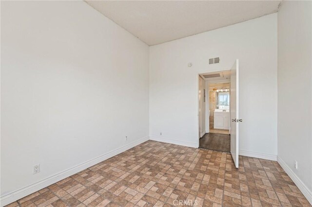 450 E 4th St Unit 419, Santa Ana, CA 92701 - unfurnished room featuring brick patterned flooring
