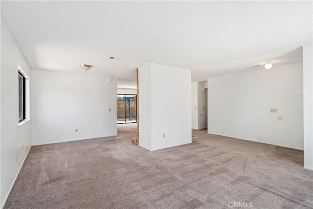 37224 Halfmoon Dr, Palmdale, CA 93550 - unfurnished room featuring carpet and a textured ceiling