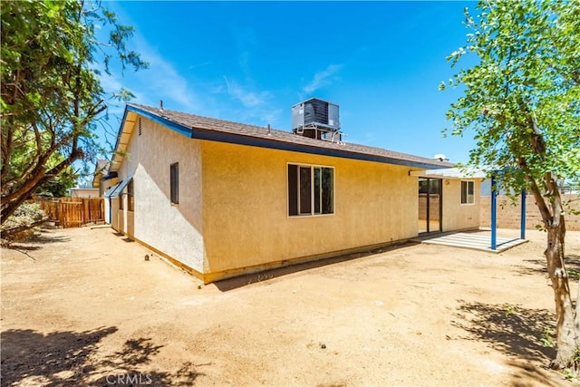 37224 Halfmoon Dr, Palmdale, CA 93550 - back of house featuring stucco siding and a patio
