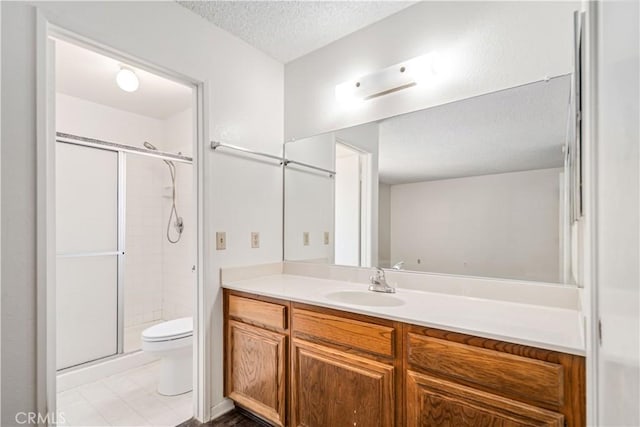37224 Halfmoon Dr, Palmdale, CA 93550 - full bathroom with a stall shower, vanity, and a textured ceiling