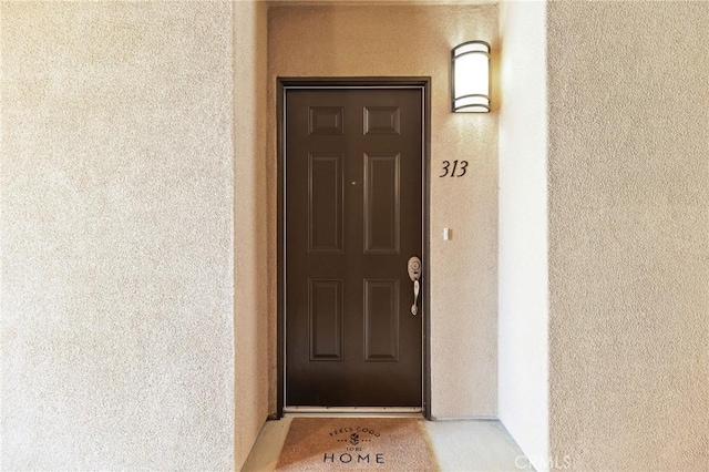 2750 Artesia Blvd Unit 313, Redondo Beach, CA 90278 - view of exterior entry with stucco siding