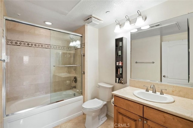 2750 Artesia Blvd Unit 313, Redondo Beach, CA 90278 - full bathroom with vanity, shower / bath combination with glass door, tile patterned floors, and a textured ceiling