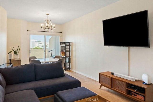 2750 Artesia Blvd Unit 313, Redondo Beach, CA 90278 - living area featuring a chandelier and light wood-type flooring
