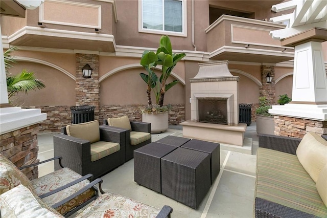 2750 Artesia Blvd Unit 313, Redondo Beach, CA 90278 - view of patio / terrace with an outdoor living space with a fireplace