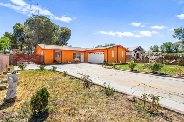 43236 W 20th St W, Lancaster, CA 93534 - ranch-style home featuring a garage, driveway, and a gate