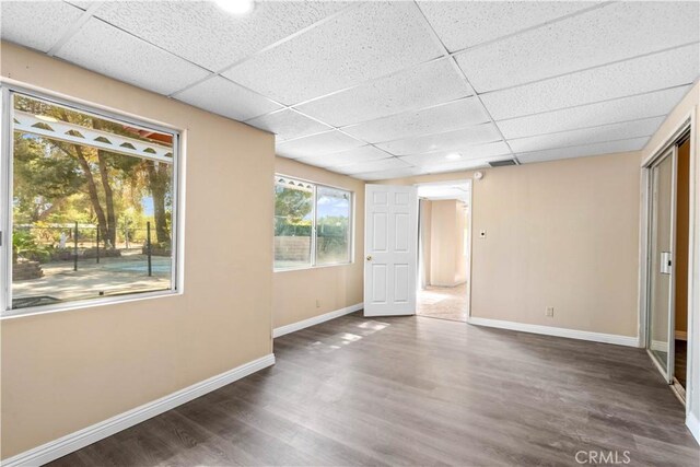 43236 W 20th St W, Lancaster, CA 93534 - unfurnished room featuring a drop ceiling and wood finished floors