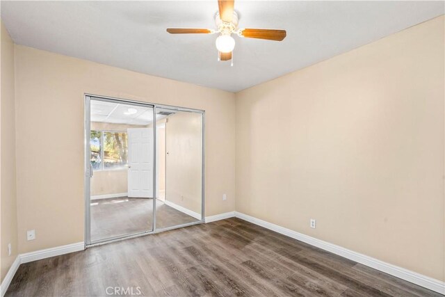 43236 W 20th St W, Lancaster, CA 93534 - unfurnished bedroom with wood finished floors, a closet, and ceiling fan