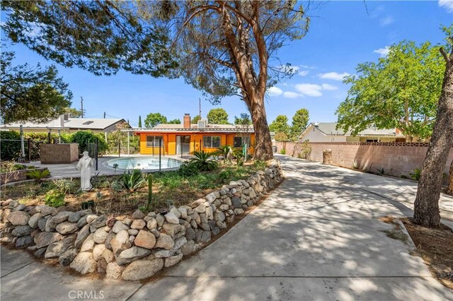 43236 W 20th St W, Lancaster, CA 93534 - single story home with a chimney and a patio area