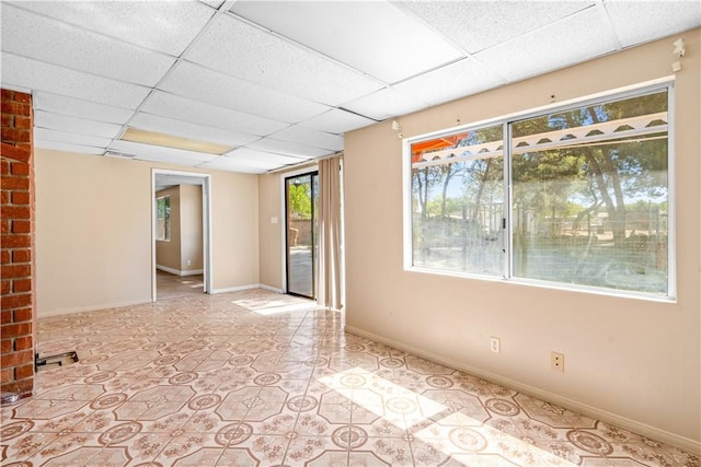 43236 W 20th St W, Lancaster, CA 93534 - unfurnished room featuring a drop ceiling and baseboards
