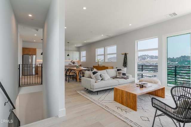 3874 W Point Dr, Los Angeles, CA 90065 - living room with light wood-style floors and recessed lighting