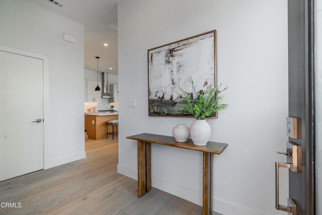 3874 W Point Dr, Los Angeles, CA 90065 - corridor with light wood finished floors and recessed lighting