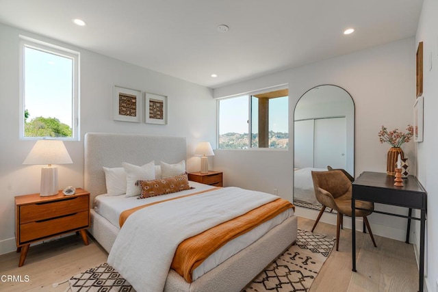 3874 W Point Dr, Los Angeles, CA 90065 - bedroom with light wood-type flooring, recessed lighting, and a closet