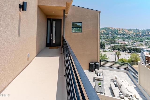 3874 W Point Dr, Los Angeles, CA 90065 - entrance to property with a balcony and stucco siding