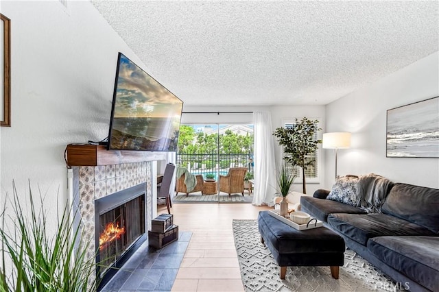 1442 Brett Pl Unit 31, San Pedro, CA 90732 - living area featuring a textured ceiling and a fireplace