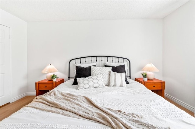 1442 Brett Pl Unit 31, San Pedro, CA 90732 - bedroom with wood finished floors and baseboards